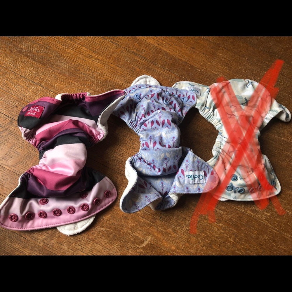 2 Grovia Newborn cloth diapers.